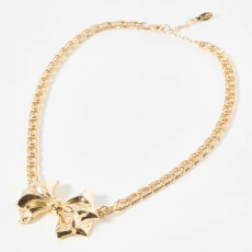 Gold Misha Chunky Bow Statement Necklace