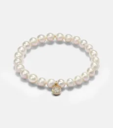 14kt gold and pearl bracelet with diamond 14kt gold and pearl bracelet with diamond