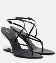 AlaÃa Patent leather wedge thong sandals AlaÃa Patent leather wedge thong sandals