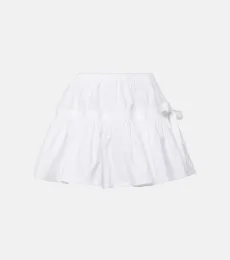 Alaïa Mini-jupe à volants et nœud Alaïa Mini-jupe à volants et nœud
