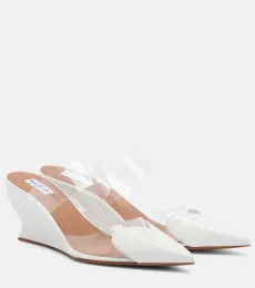 Alaïa Mules compensées Le Coeur en cuir verni Alaïa Mules compensées Le Coeur en cuir verni
