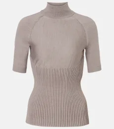 Alaïa Top à col roulé en laine mélangée Alaïa Top à col roulé en laine mélangée