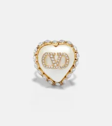 Anillo adornado con VLogo