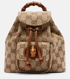 Bamboo Medium leather-trimmed canvas backpack Bamboo Medium leather-trimmed canvas backpack