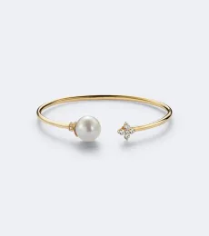 Bloom 18kt gold cuff bracelet with pearl and diamonds Bloom 18kt gold cuff bracelet with pearl and diamonds
