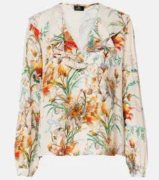 Blusa floral con volantes Blusa floral con volantes
