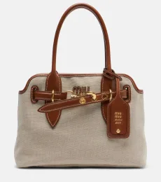 Bolso Aventure Small de lona con piel Bolso Aventure Small de lona con piel