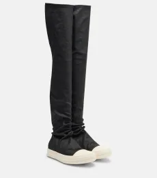 Botas mosqueteras de denim Botas mosqueteras de denim
