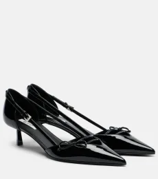 Bow-detail patent leather pumps Bow-detail patent leather pumps