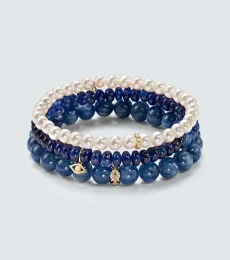 Bracelet en or 14 ct, perle, kyanite, diamants et saphirs