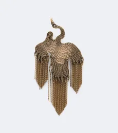 Broche con flecos
