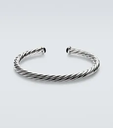 Cable 14kt gold (5851000) and 925 sterling silver cuff bracelet with onyx Cable 14kt gold (5851000) and 925 sterling silver cuff bracelet with onyx