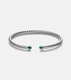 Cable Flex sterling silver and 14kt gold cuff bracelet with onyxes Cable Flex sterling silver and 14kt gold cuff bracelet with onyxes