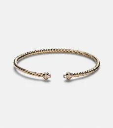 Cablespira Flex 18kt gold cuff bracelet with freshwater pearls and diamonds Cablespira Flex 18kt gold cuff bracelet with freshwater pearls and diamonds