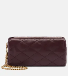 Cassandre quilted leather clutch Cassandre quilted leather clutch