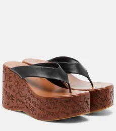 Chloé Mules compensées Maxime en cuir Chloé Mules compensées Maxime en cuir