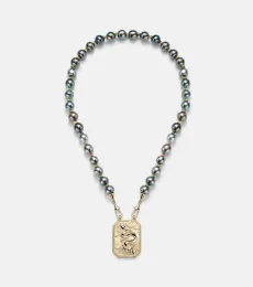 Collier Dragon en or 18 ct, perle et rubis Collier Dragon en or 18 ct, perle et rubis