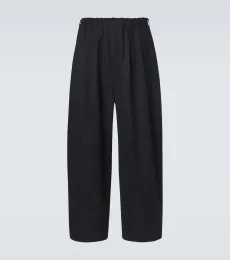 Comme des Garçons Homme Pantalones anchos de sarga de algodón Comme des Garçons Homme Pantalones anchos de sarga de algodón