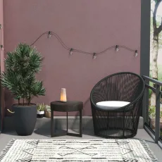 COSMOLIVING Taura Resin Lounge Chair Outdoor Black COSMOLIVING Taura Resin Lounge Chair Outdoor Black