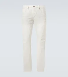 Distressed slim jeans