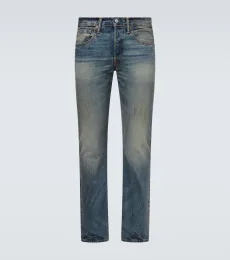 Distressed slim jeans