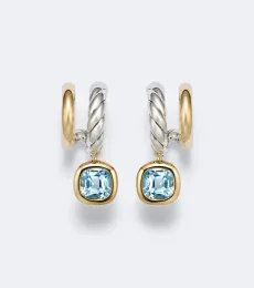 DY Mercer 18kt gold and sterling silver earrings with topaz