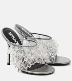 Embellished PVC mules Embellished PVC mules