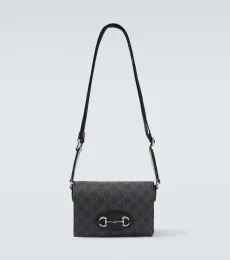 GG Supreme leather-trimmed canvas crossbody bag