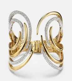Golden Strada 18kt gold and white gold cuff bracelet with diamonds Golden Strada 18kt gold and white gold cuff bracelet with diamonds