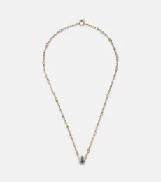 Gravity 18kt gold chain necklace with diamond and emerald