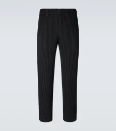 Homme Plissé Issey Miyake Pantalones rectos Basics plisados