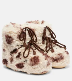 Icon cow-print snow boots