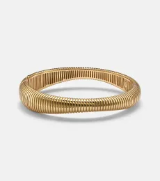 Isla Flow II 18kt gold bangle Isla Flow II 18kt gold bangle