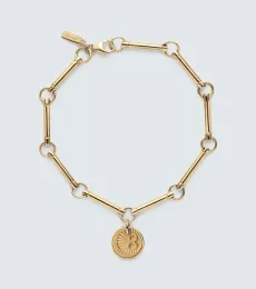 Karma 18kt yellow gold chain bracelet Karma 18kt yellow gold chain bracelet