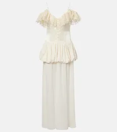 Lace-trimmed peplum maxi dress Lace-trimmed peplum maxi dress