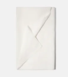 Lace-trimmed tablecloth