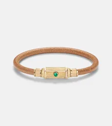 Lasso 18kt gold and leather bracelet with emeralds Lasso 18kt gold and leather bracelet with emeralds