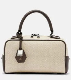 Leather-trimmed top-handle bag