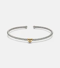 Micro Cable Flex Heart Station 14kt gold and 925 sterling silver bracelet Micro Cable Flex Heart Station 14kt gold and 925 sterling silver bracelet