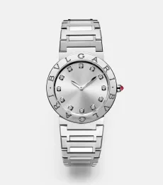 Montre Bvlgari Bvlgari Lady 33mm en acier inoxydable, diamants et rubellite Montre Bvlgari Bvlgari Lady 33mm en acier inoxydable, diamants et rubellite