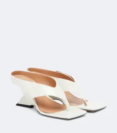 Mules compensées Cheope en cuir verni Mules compensées Cheope en cuir verni