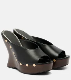 Mules con cuña 115 de piel con tachuelas Mules con cuña 115 de piel con tachuelas
