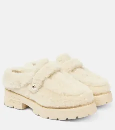 Mules con plataforma Shea de borrego Mules con plataforma Shea de borrego