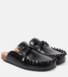 Mules de piel con volantes