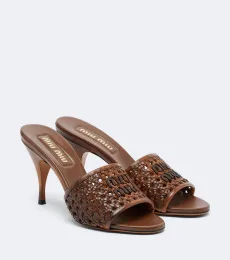 Mules de piel trenzados Mules de piel trenzados
