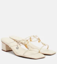 Mules en cuir à ornement