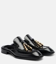 Mules en cuir à ornements