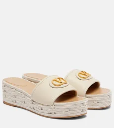 Mules VLogo à plateforme en cuir Mules VLogo à plateforme en cuir