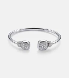 Nudo 18kt white gold bracelet with diamonds and topaz Nudo 18kt white gold bracelet with diamonds and topaz