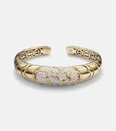 Onda 18kt gold bangle with diamonds Onda 18kt gold bangle with diamonds